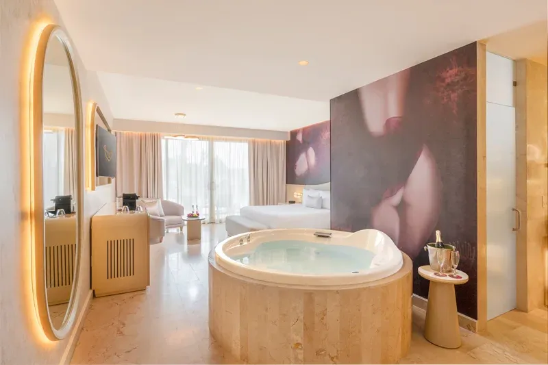 Beloved Tropical-View Jacuzzi Suite with round indoor jacuzzi and open bedroom