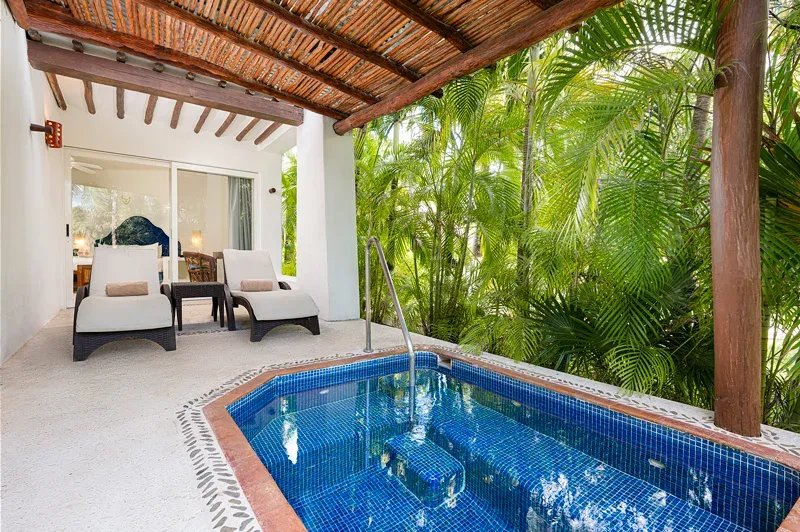 Private plunge pool and loungers on a shaded Master Suite terrace